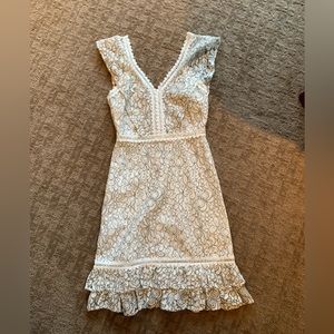 Lace, white Anthropologie dress. Flattering ruffles and details!
